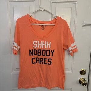 Orange “Shhh Nobody Cares” Shirt